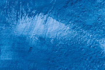 Grunge classic blue concrete background. Textured plaster wall. Creative backdrop for your design....