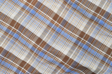 Abstract blue brown and white plaid flannel background