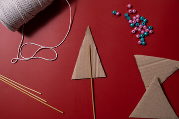 Christmas trees made of rope Sustainable Christmas preparation Diy process of making handmade decor. Step by step activity for children. Inclusive and responsible stress relief holiday hobby