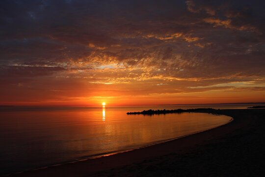 stunning orange and gold beach sunrise