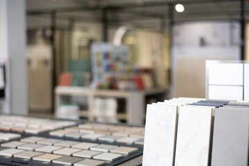 Variety of ceramic tile samples displayed in hardware store