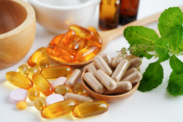 Alternative medicine herbal organic capsule with vitamin E omega 3 fish oil, mineral, drug with...