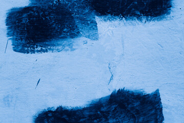 Grunge classic blue concrete background. Textured plaster wall. Creative backdrop for your design. Color of the year 2026 concept. Top view, layout for design. Surface with peeling shabby pattern.