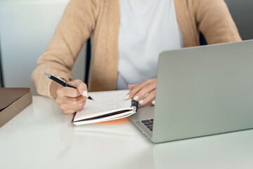 Fototapeta premium Happy young Asian Woman Successful working with laptop checking happy congrats get good news Young asian feel excited and colleague student&nbsp;passed exam