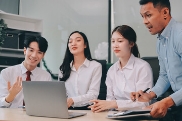 Entrepreneurs and business people conference in modern meeting room, happy multiracial coworkers have fun cooperating working together at office meeting, asian teamwork concept