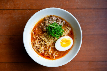 Ramen isolated on wooden table background