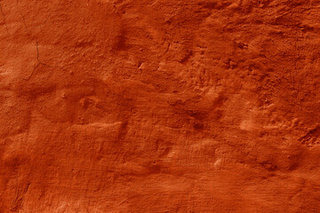 Grunge lush lava concrete background. Textured plaster wall. Creative backdrop for your design. Color of the year 2025 concept. Top view, layout for design. Surface with peeling shabby pattern.