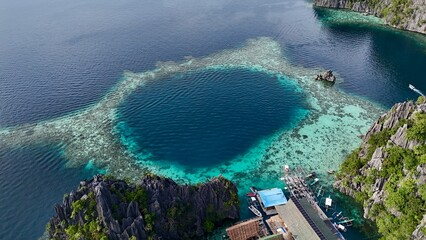 Aerial View of Stunning Coral Reef Lagoon in the Philippines with Limestone Cliffs © Klimenok