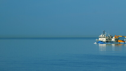 Fishing Vessel Sailing On Waves In Sea To Fish. Sea Summer Ocean Daylight Nature Background. Still.