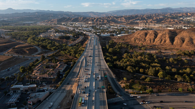 Santa Clarita, California, USA - October 24, 2024: Afternoon rush hour traffic passes on the 5 freeway through downtown Santa Clarita.
