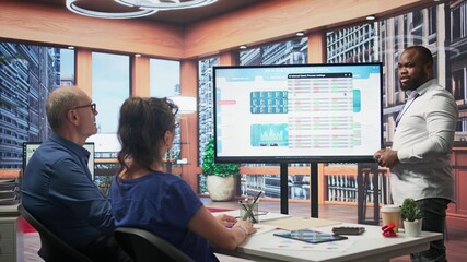 Financial expert presenting retirement plan options to senior people, reading contract terms to secure pension with life savings. Adviser offers counseling for middle aged clients. Camera B. © DC Studio