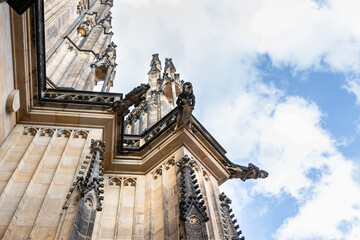 The soaring  ornate facade of St Vitus Cathedral near New Royal Palace in Prague in Czech Republic