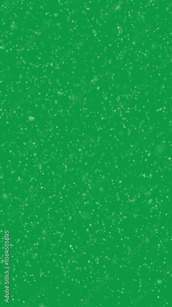 Poster seamless loop blurred snowflakes on clean green vertical animation copy space background.
