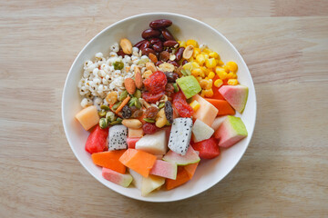 Mixed fruits salad on table.