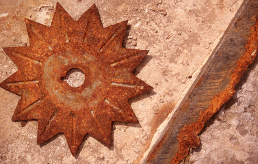 Abstract still life of rusty metal star shaped object