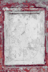 Vintage frame on the plaster wall. Scary background on damaged grungy and broken concrete wall with copy space. High quality picture.