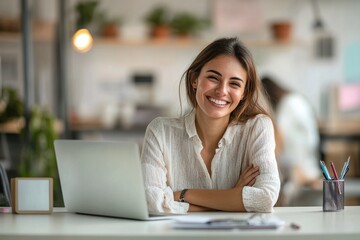 Portrait of laughing businesswoman sitting at desk in the office, Depth of field