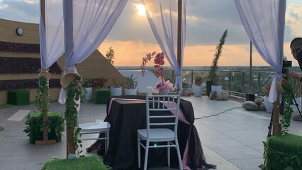 Holidays romantic, dinner table and setting for valentines day, fine dining or date at indoor night restaurant. Interior diner for evening couple reservation