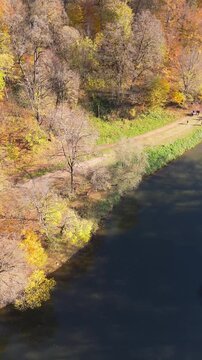 Colorful view of the autumn forest with lake. Parz Lake in Tavush, Armenia. Taken with a drone