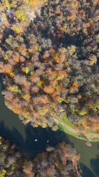 Colorful view of the autumn forest with lake. Parz Lake in Tavush, Armenia. Taken with a drone