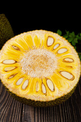 Ripe a half Jackfruit tropical fruit on table.