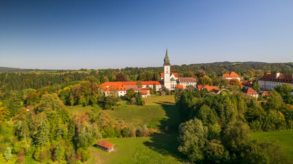Aerial view of Rottenbuch, parish church Mariä Geburt in Germany.