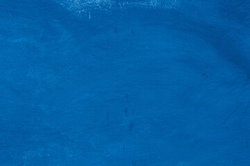 Grunge classic blue concrete background. Textured plaster wall. Creative backdrop for your design....