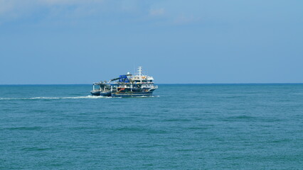 Fishing Ship On The Black Sea. Fishing Boat Trawler Ship Sailing On Sea. Still. © artifex.orlova