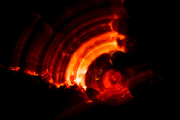 fire abstraction painting with lens, real photo, dark background, blur, dynamic, effect, 