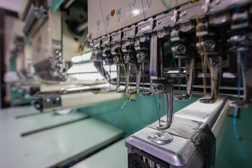 Embroidery student school name tag in Textile Industry at Garment Manufacturers Kota Kinabalu, Sabah, Malaysia.(selective focus and soft focus)