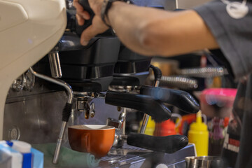 Coffee machine making espresso in a cafe restaurant