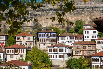 Fototapeta premium Traditional Ottoman Houses in Safranbolu. Safranbolu UNESCO World Heritage Site. Old wooden mansions turkish architecture. Safranbolu landscape view.