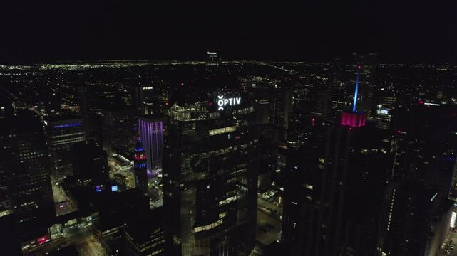 City nightlights with Optiv building as focus 4k drone footage Dlog 10 Bit ungraded