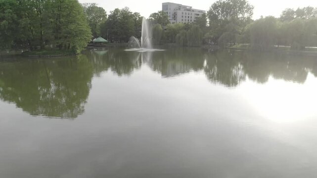 Skimming pond to a fountain 4k drone footage Dlog 10 Bit ungraded
