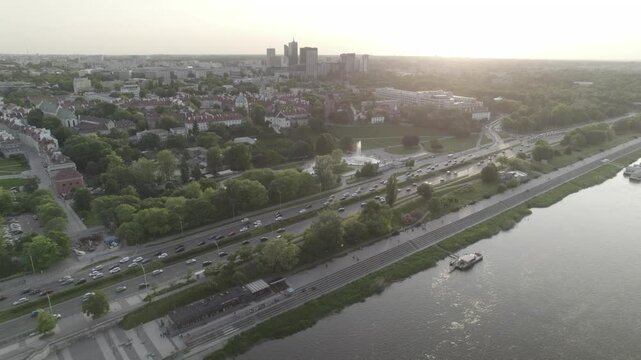 River with road and fountain in the sunset 4k drone footage Dlog 10 Bit ungraded