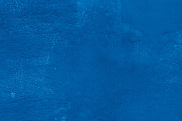Grunge classic blue concrete background. Textured plaster wall. Creative backdrop for your design....