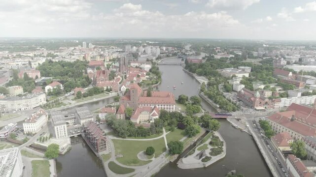 Pan out above splitting river in Europe 4k drone footage Dlog 10 Bit ungraded