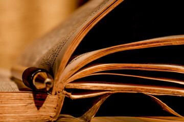 a thick book in a low light room