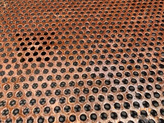 close up view Dotted Rusty Steel Plate surface.