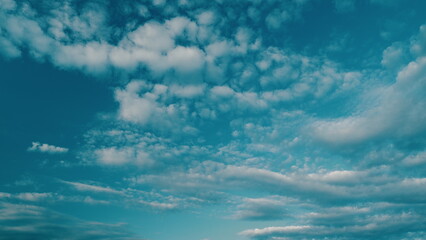 Sky with cirrocumulus clouds weather nature cloud. Cirrocumulus fine clouds texture on blue sunset...