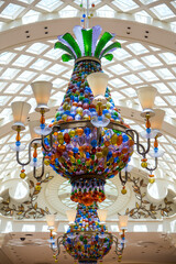 Luxury Chandelier on the modern roof in Encore hotel and Casino.