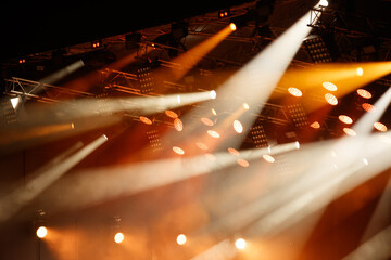Red-orange color on stage at a concert