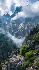 Majestic Mountain Peaks Piercing Through Clouds