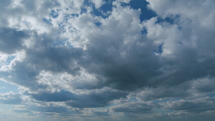 Tropical summer or spring sunlight with stratocumulus clouds. Two layers of cloudiness. Tropical...