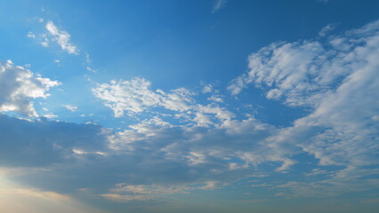 Obraz premium Sky at dusk and cirrocumulus clouds. Breathtaking landscape of phenomenal cirrocumulus clouds. Timelapse.