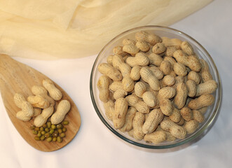 Bowl of Peanuts Snack on Table with White Background