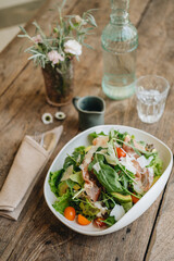 Parma ham salad served in a white plate