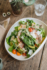 Parma ham salad served in a white plate
