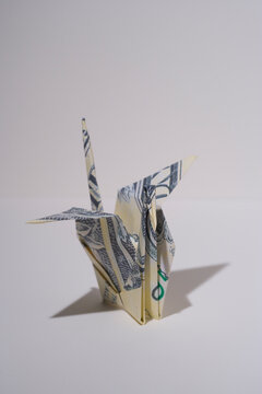 High angle close up of a origami bird made from US bills.