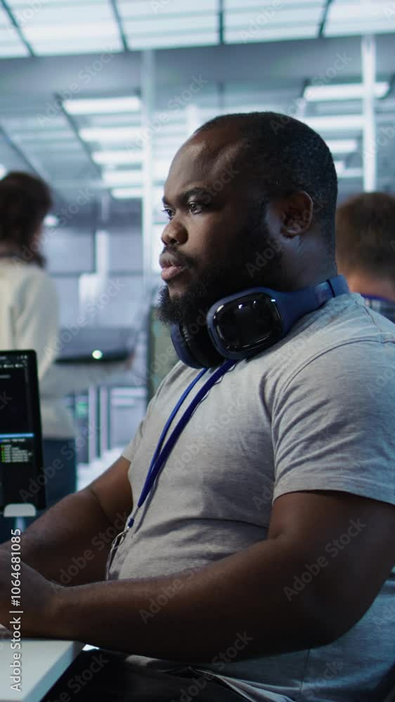 Poster engineer working in high tech establishment providing computing resources for different workloads. a